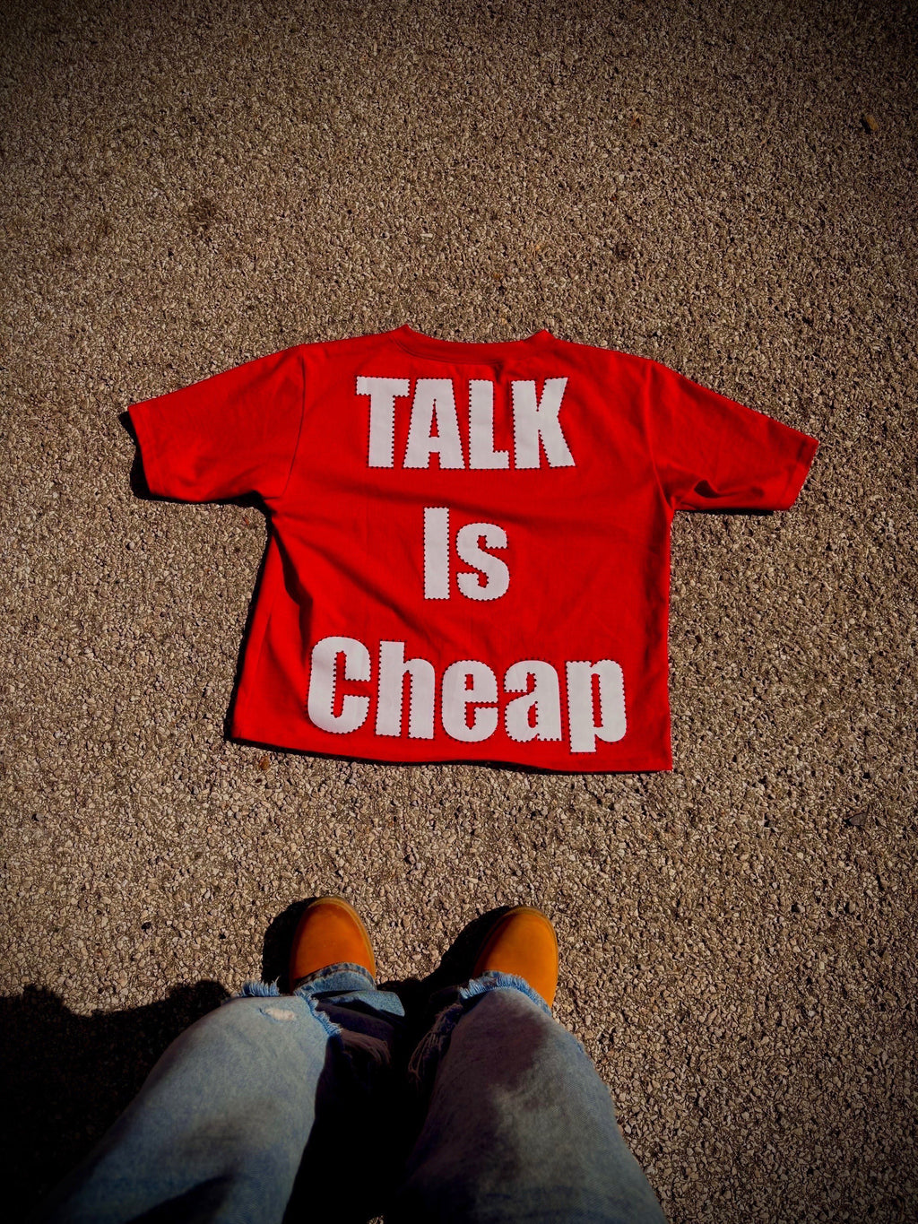 Talk Is Cheap® Statement Tee Red