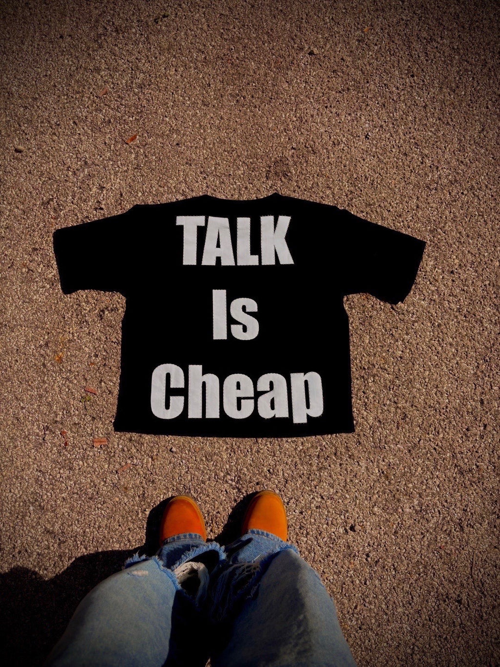 Talk Is Cheap® Statement Tee Black